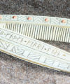 Hand crafted antler and bone comb with case, the runic inscription modified from a famous find to read  'Aidan makes a good comb'. Size: approx. 200mm long